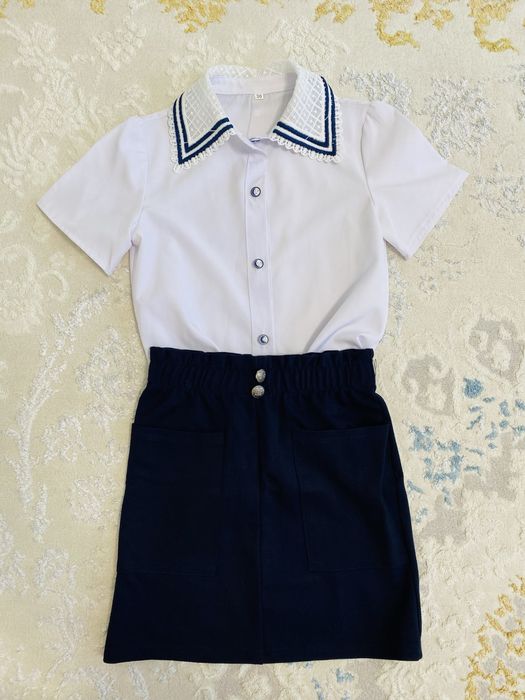 Продам школьную форму девочке 128 размер