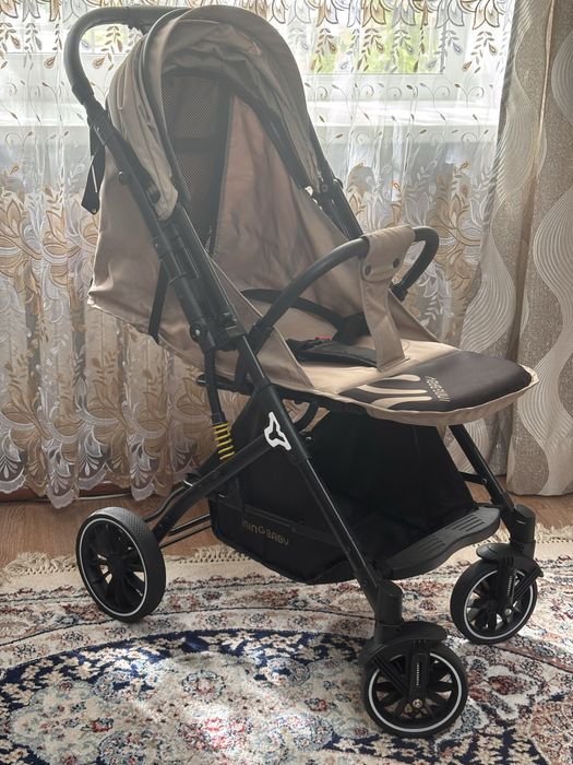 Продам детскую прогулочную коляску Ining baby