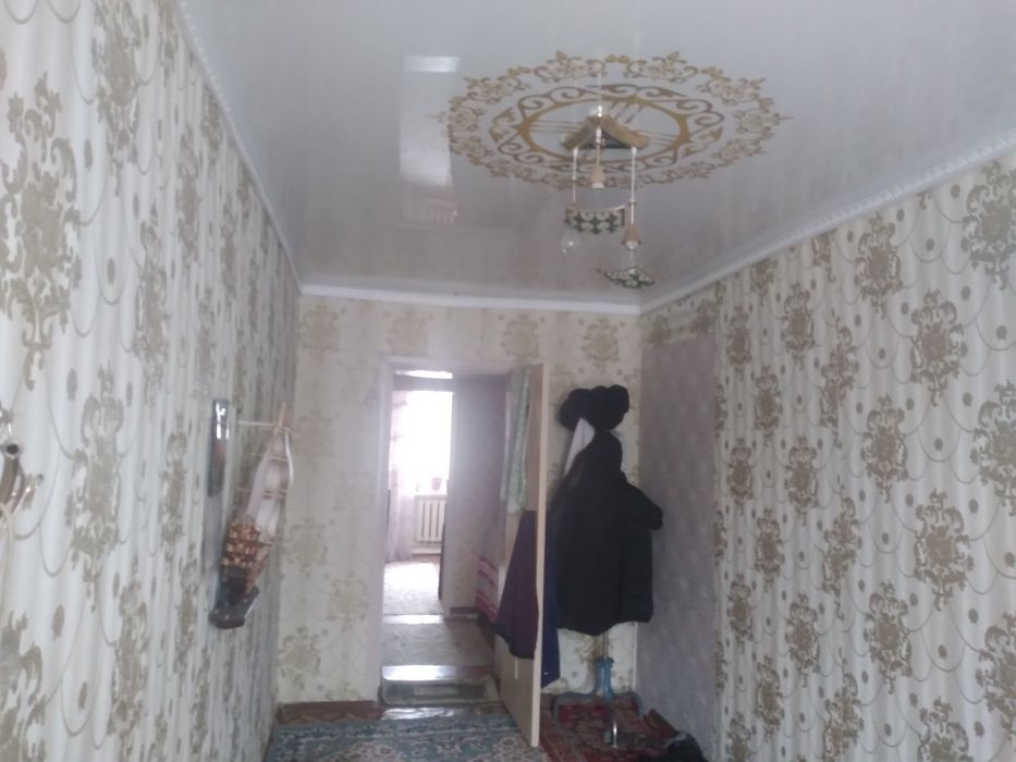 Үш бөлмелі пәтер.