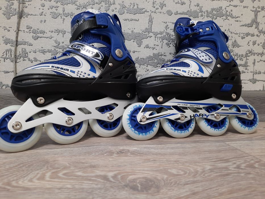 Роликовые коньки