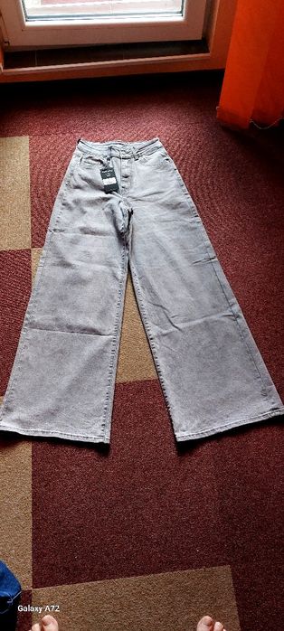 Pantaloni blugi damă