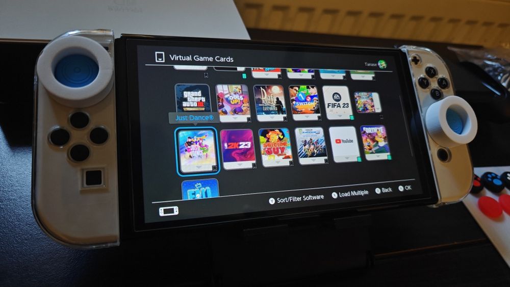 Nintendo Switch OLED (Ca Nou) + Jocuri  + accesorii