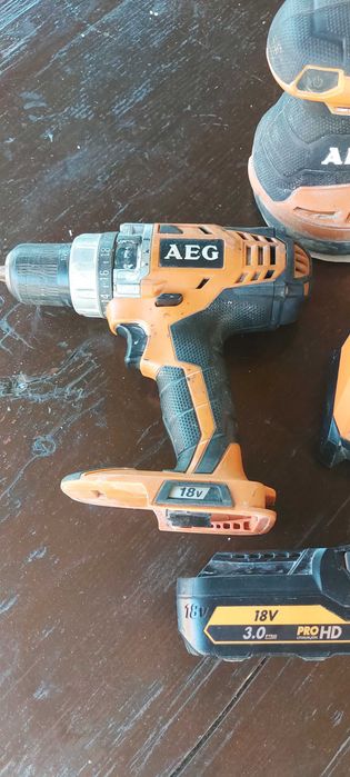 Set scule cu acumulator AEG 18V - Mașină de găurit, Șlefuitor, Baterie 5Ah, Încărcător