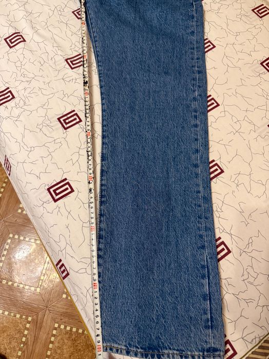 Одежда Levis (джинсы и рубашки)