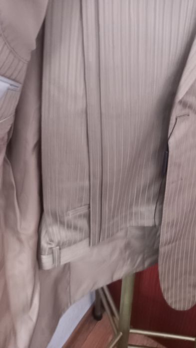 Продам новый костюм