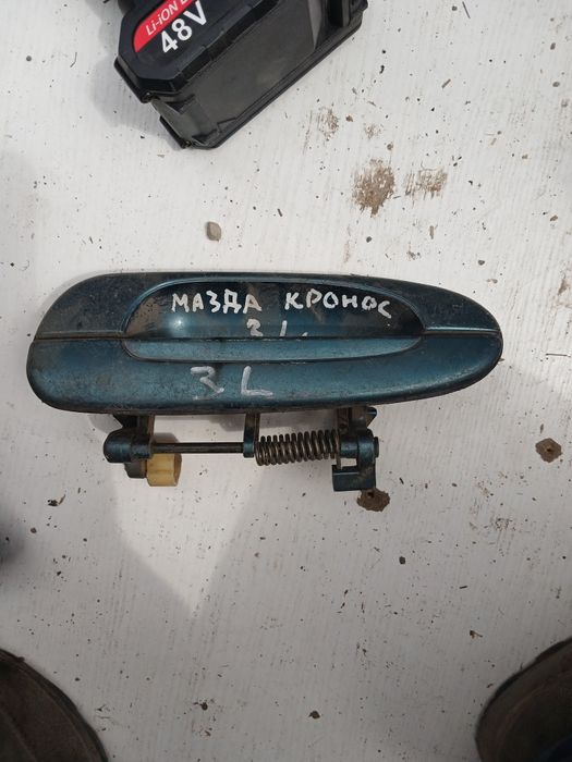 Ручка Мазда Кронос