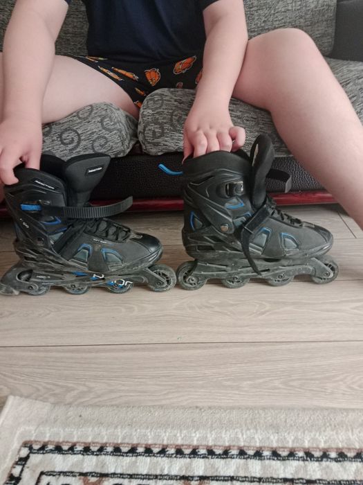 Роликовые коньки