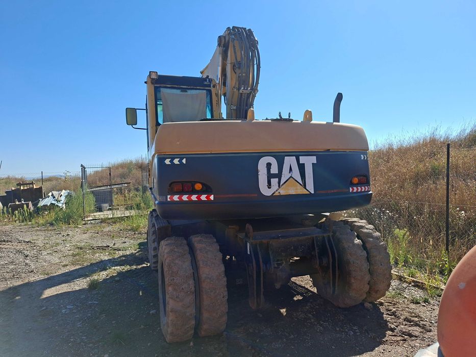 Excavator pe roti CAT 313M
