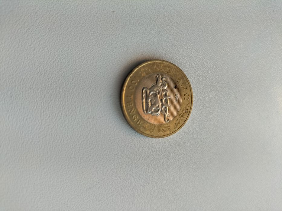 продам монету номинал 100 тенге