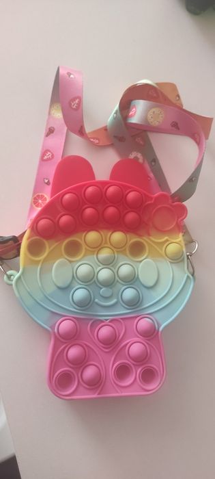 Продам игрушки попит и сумочку попит