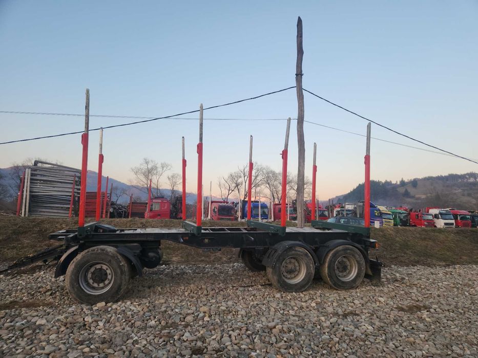 DOLL forestiera transport lemn , busteni si racoante din dezmembrări