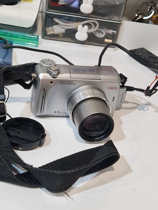 Aparat foto Olympus Corporation  NO: C-765, funcțional la priza
