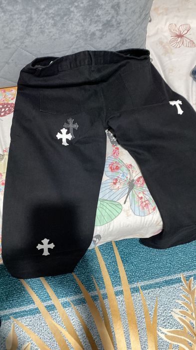 Джинсы новые с крестами