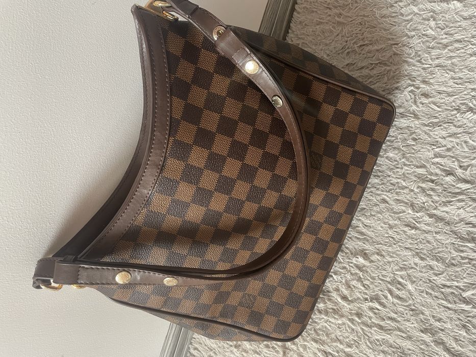 Geanta de umar Louis Vuiton