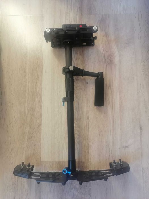 Sistem Vesta cu brat stabilizat