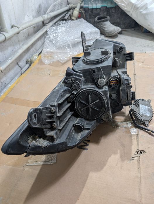 Фара левая Киа Каренс