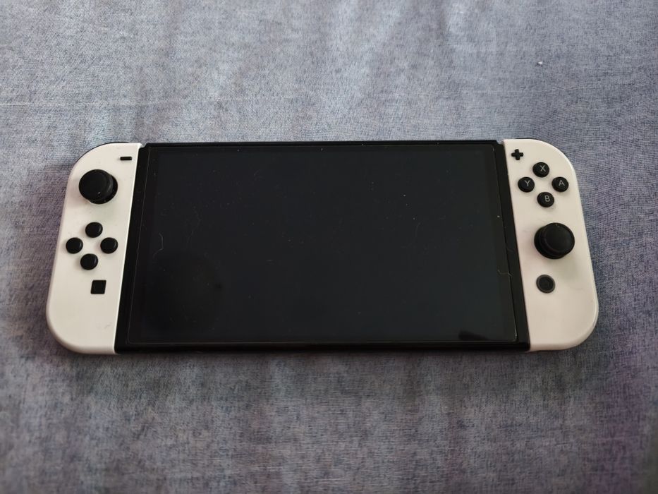 Nintendo switch Oled 256гб карта с много игри в перфектно състояние