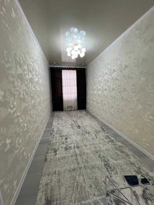 Янги кизил гиштли  домдан 2 хонали евротамирланган квартира сотилади