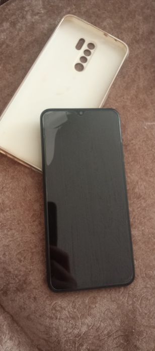 Телефон Xiaomi Redmi 9