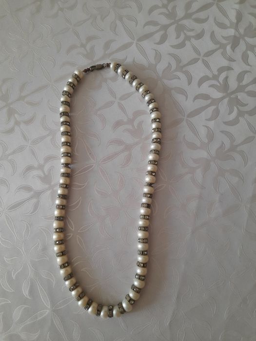 Бусы 10000 тенге