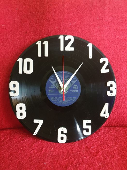 Стенен часовник от истинска плоча