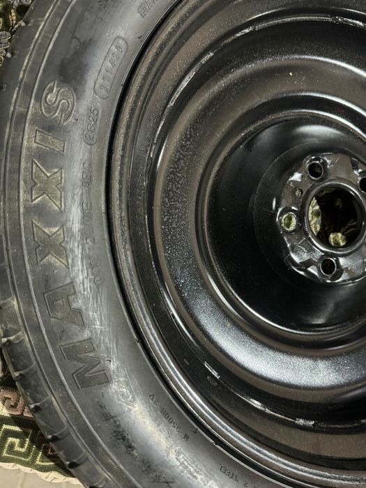 Запасное колесо ( докатка).