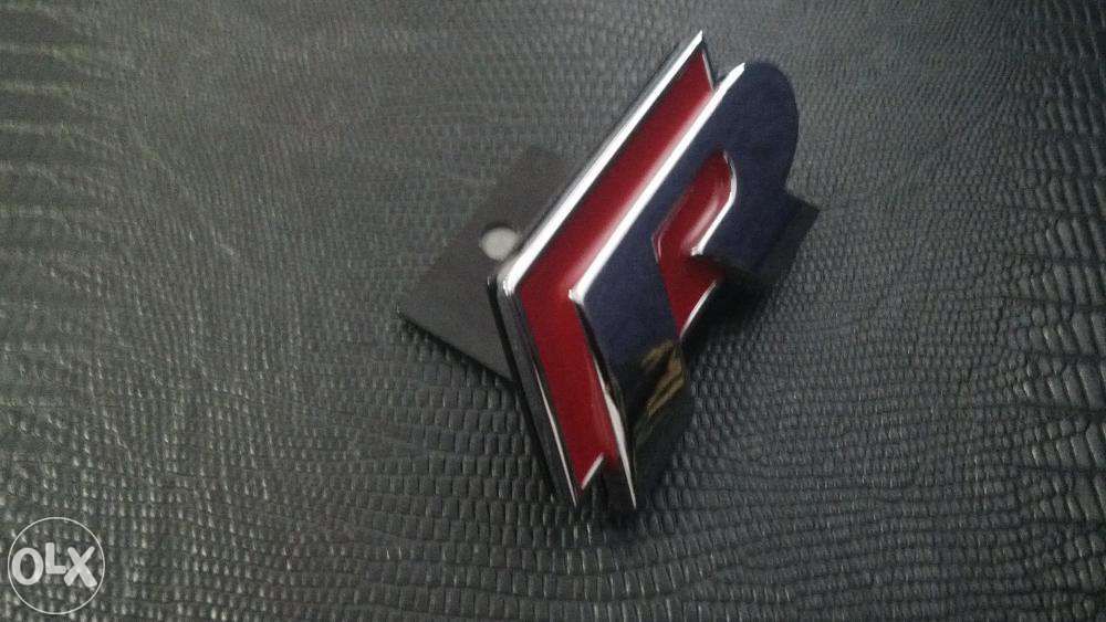 Emblema VW R-line GRILA Metal Rosu/Crom Passat/Tiguan/Tuareg/Polo/Golf