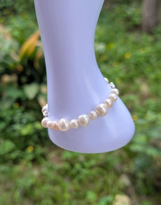 Veche bratara cu perle naturale de cultura, cu un pandantiv cu un sarpe din argint de 925