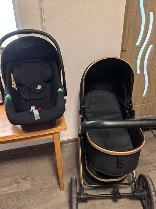 Vând căruț cu landou și scoica