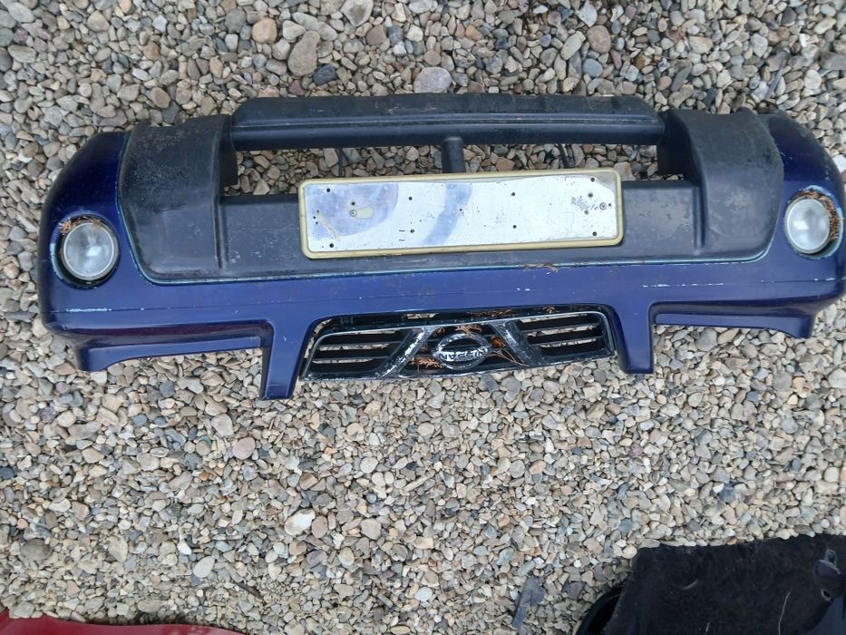 Bara Spoiler Fata Capota Aripi Nissan X Trail din 2006