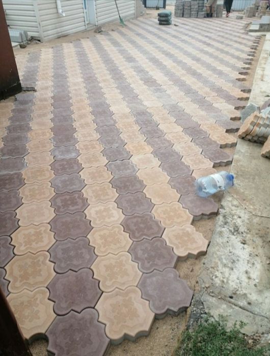 Укладка брусчатки и тротуарный плитки