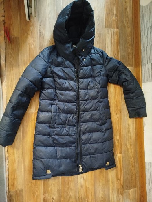 Отдам Женские пуховики куртки состояние отличное р 46.48. 
За примерно