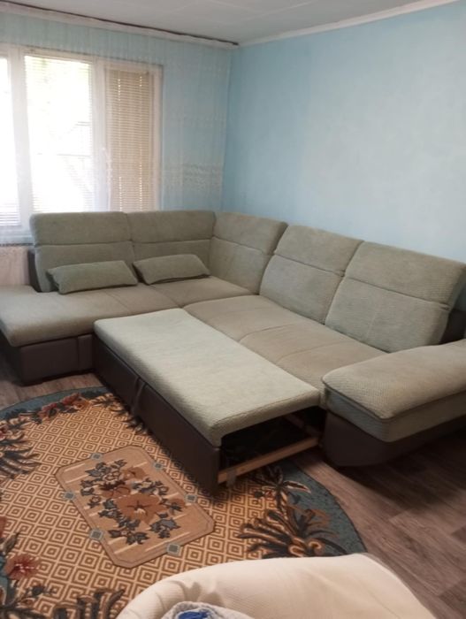 Зелен ъглов разтегателен диван