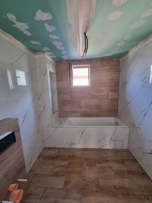 Echipa Meseriași in Constructii amenajari interioare si exterioare