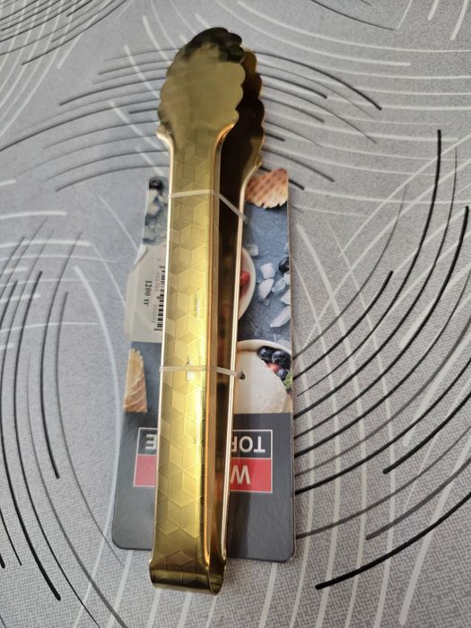 Сервировочные щипцы.