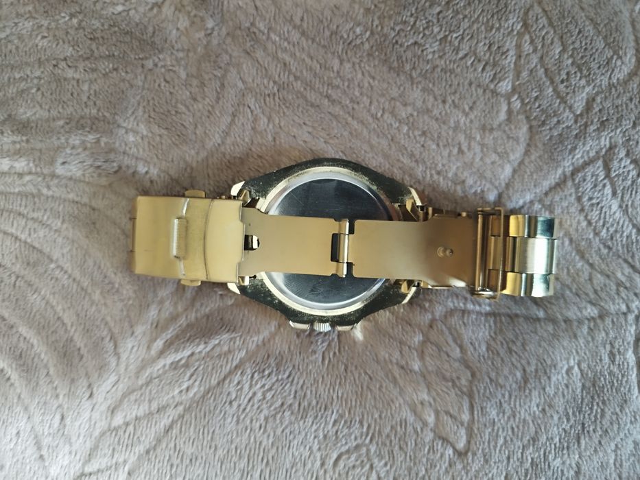 Часы Rolex золотистый