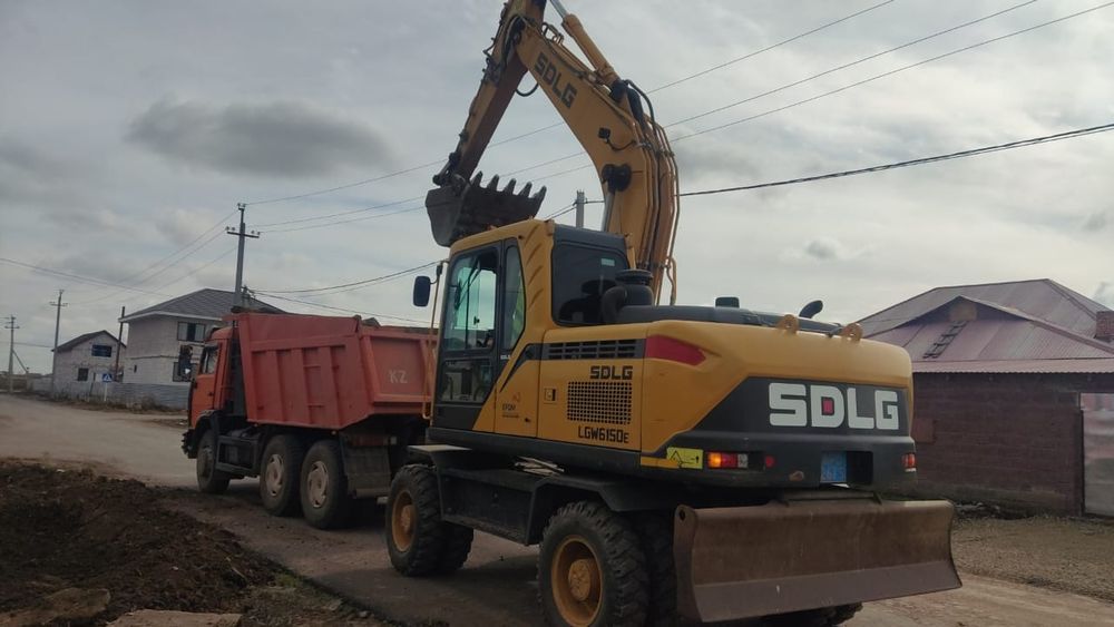 Услуги колесного экскаватора