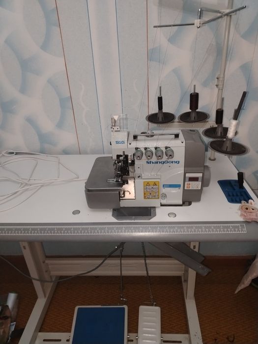 Аверлок машинка янги холатда