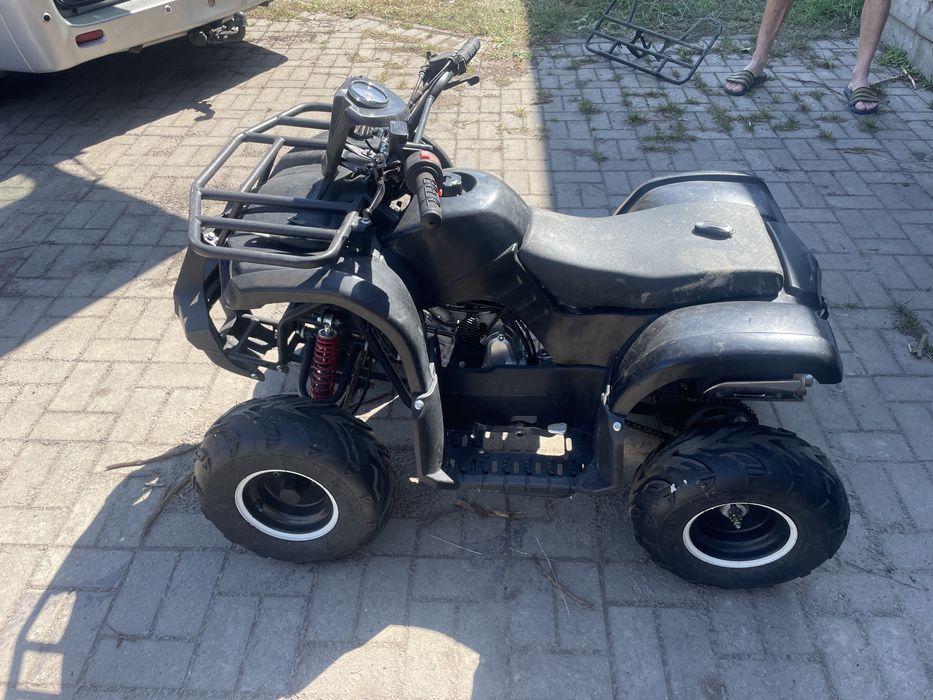 Atv kxd 125 pentru copii