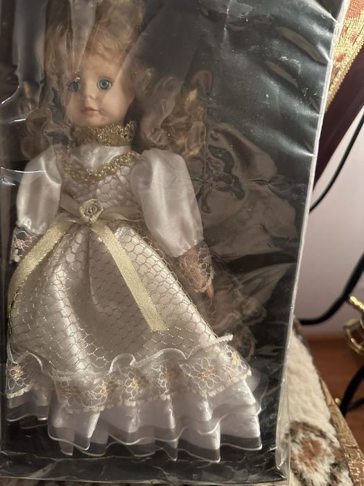 Куклы фарфоровые(коллекционные)