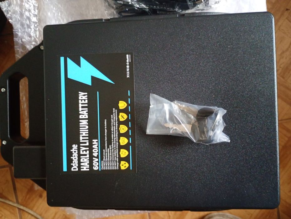 Baterie litium 60v/40A cu 2chei și  încărcător pentru scuter electric Harley Noi preț 1800lei fix nu schimb