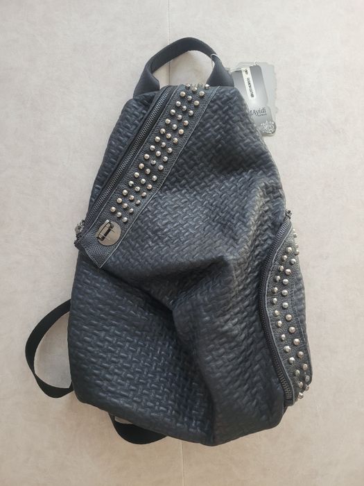 Новый кожаный рюкзак