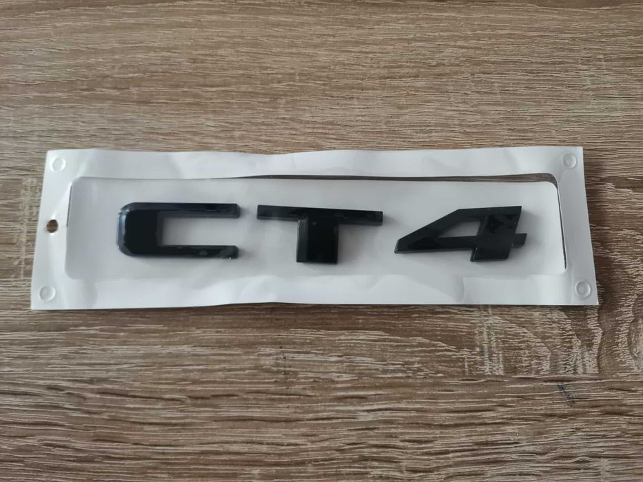 черно лого Cadillac CT4
