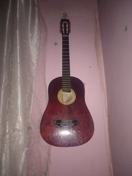 Гитара россиядан кеган