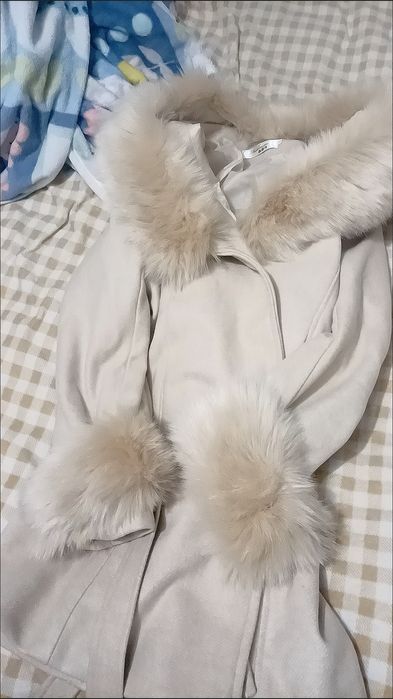 Продам пальто новый