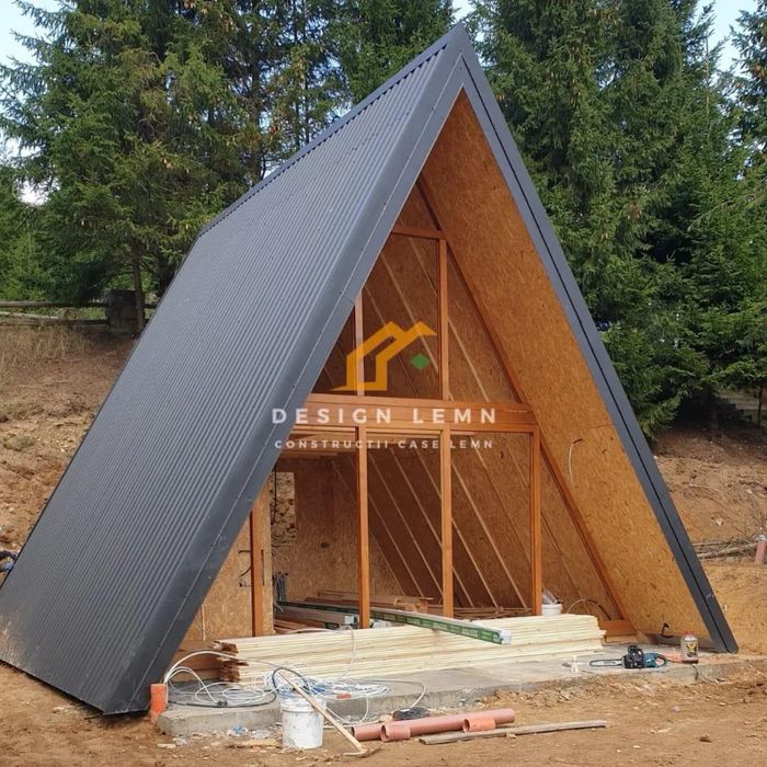 Case din lemn la cheie