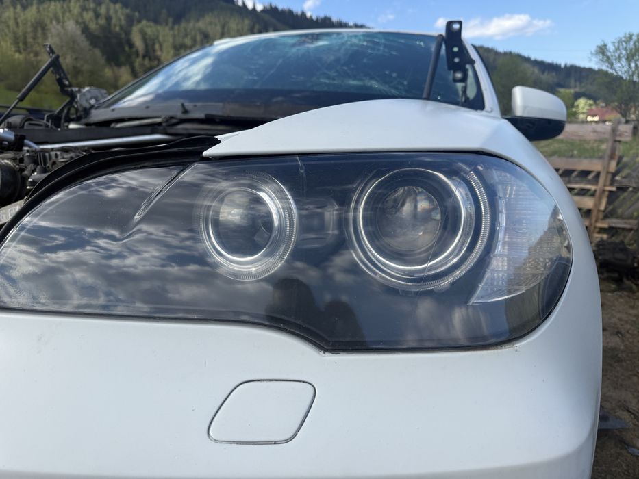 Aripa / far stanga BMW X5 E70