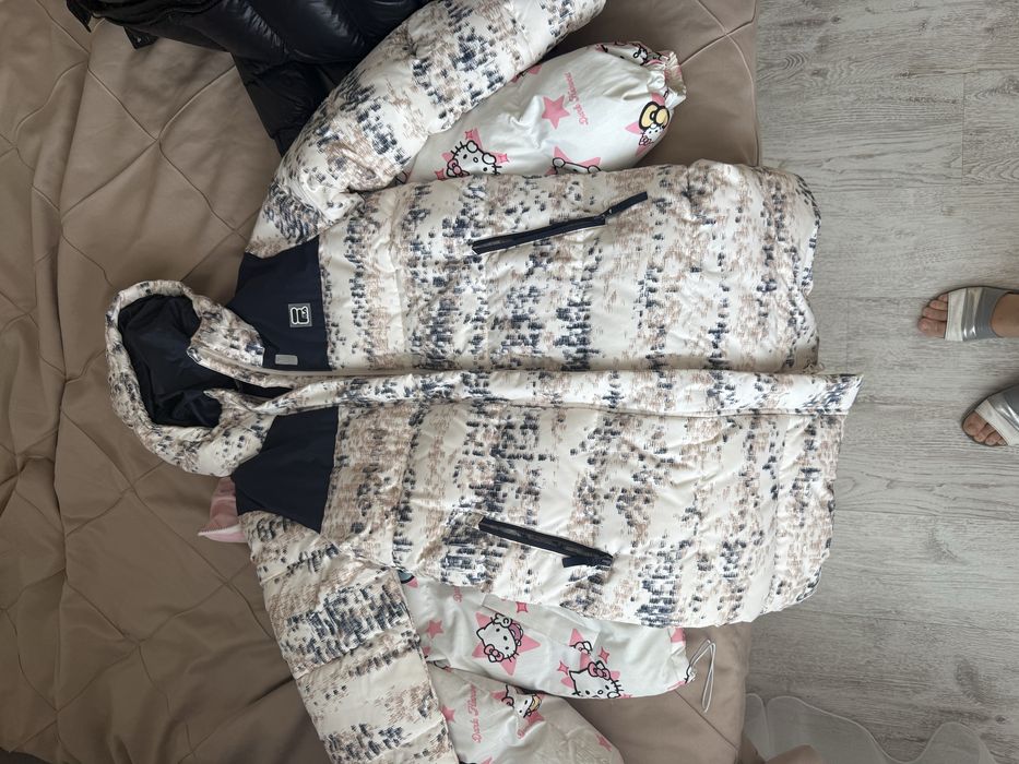 Продам зимний пуховик Fila