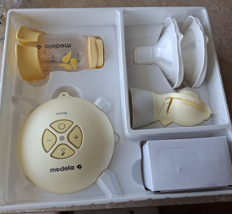 Помпа за кърмачета Medela + подарък шишета с биберони