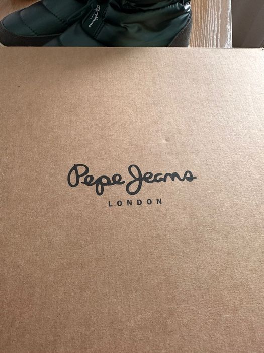 Продам новые сапоги